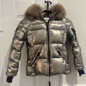 SAM. Metallic Silver Puffer Jacket with Fur Trim